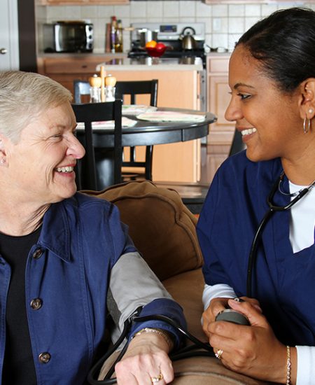 Home health care worker and an elderly woman